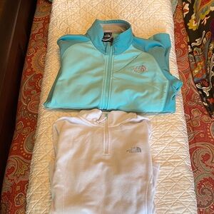 The North Face Aqua Jacket and White Quarter-Zip Pullovers
